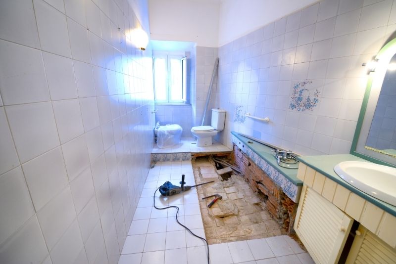 Bathroom renovation works picture with unfinish floor tiles