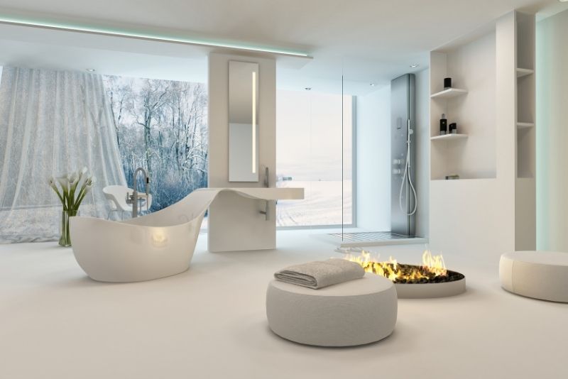 all-white bathroom with fireplace in the center