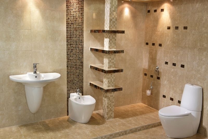 bathroom image with shower, toilet and sink