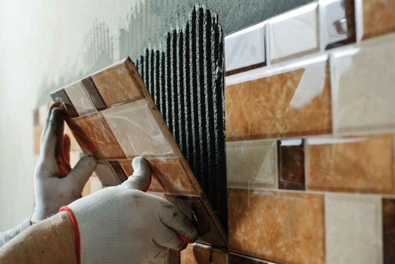 tile installation in a bathroom during bathroom makeover