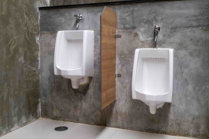 2 of different height toilet cubicle on the wall