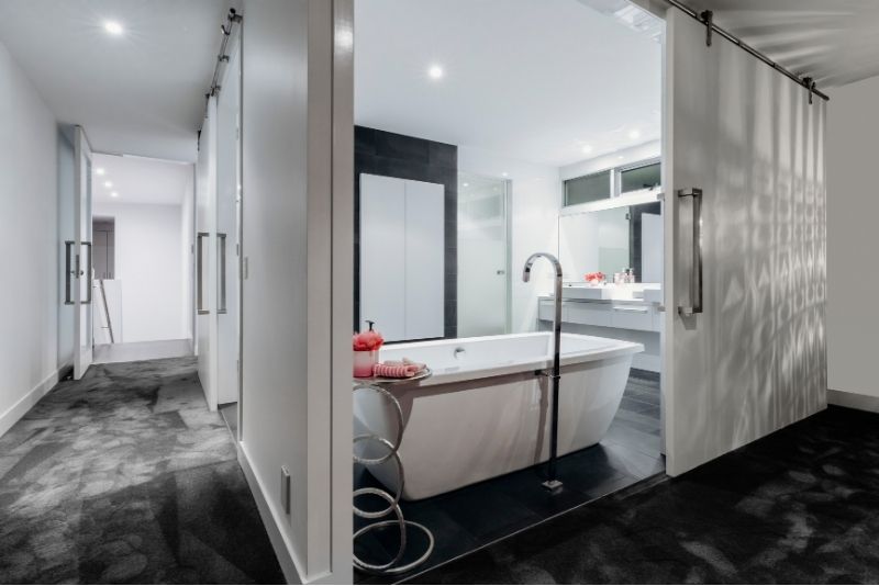 bathroom makeovers with large white bath tub