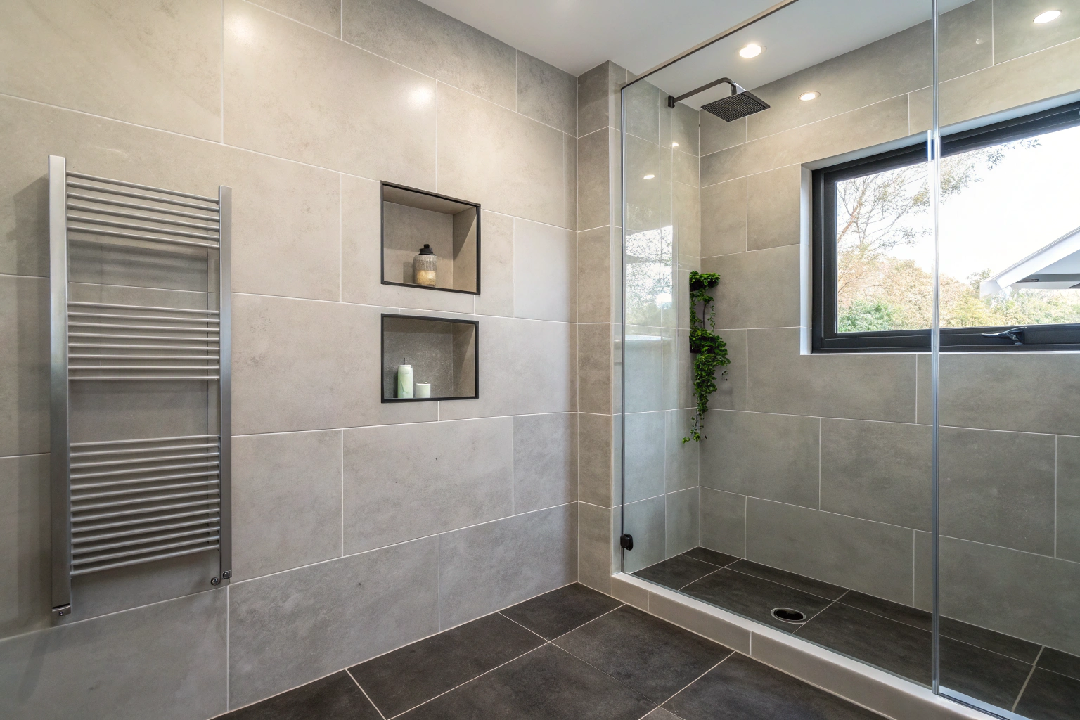 Completed large format tile shower recess in Newcastle home with minimal grout lines